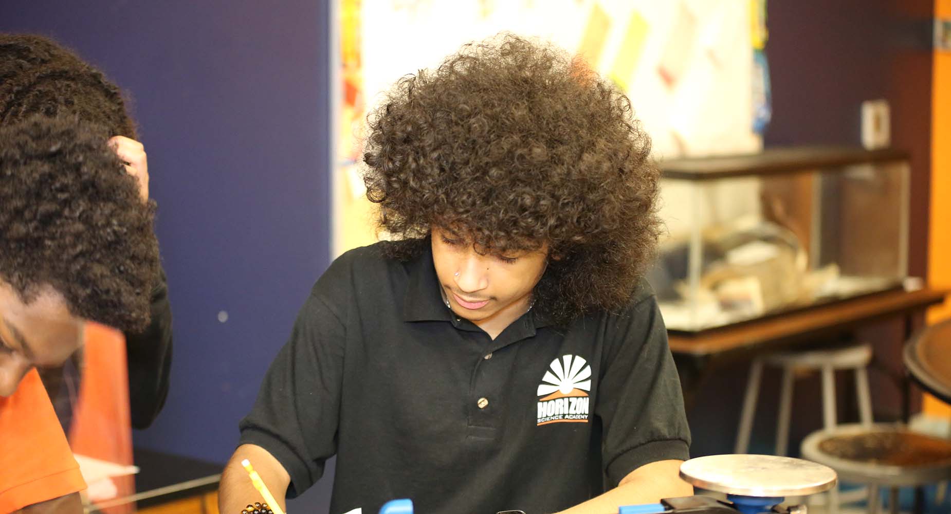 Teacher helping student