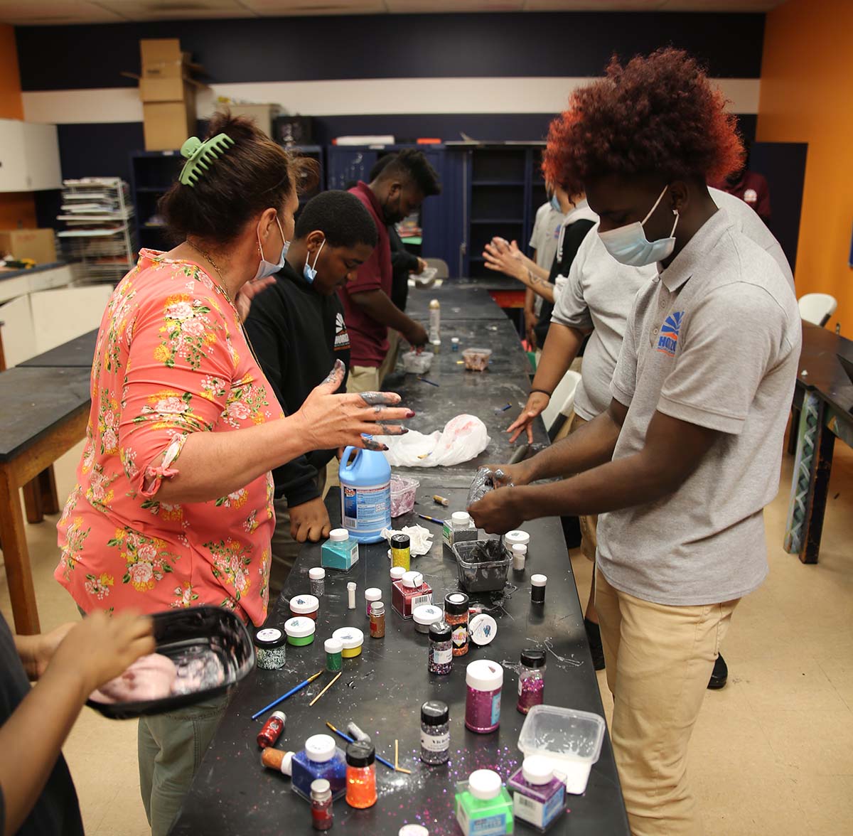 Horizon Science Academy Dayton High Teacher and student interacting at a classroom desk